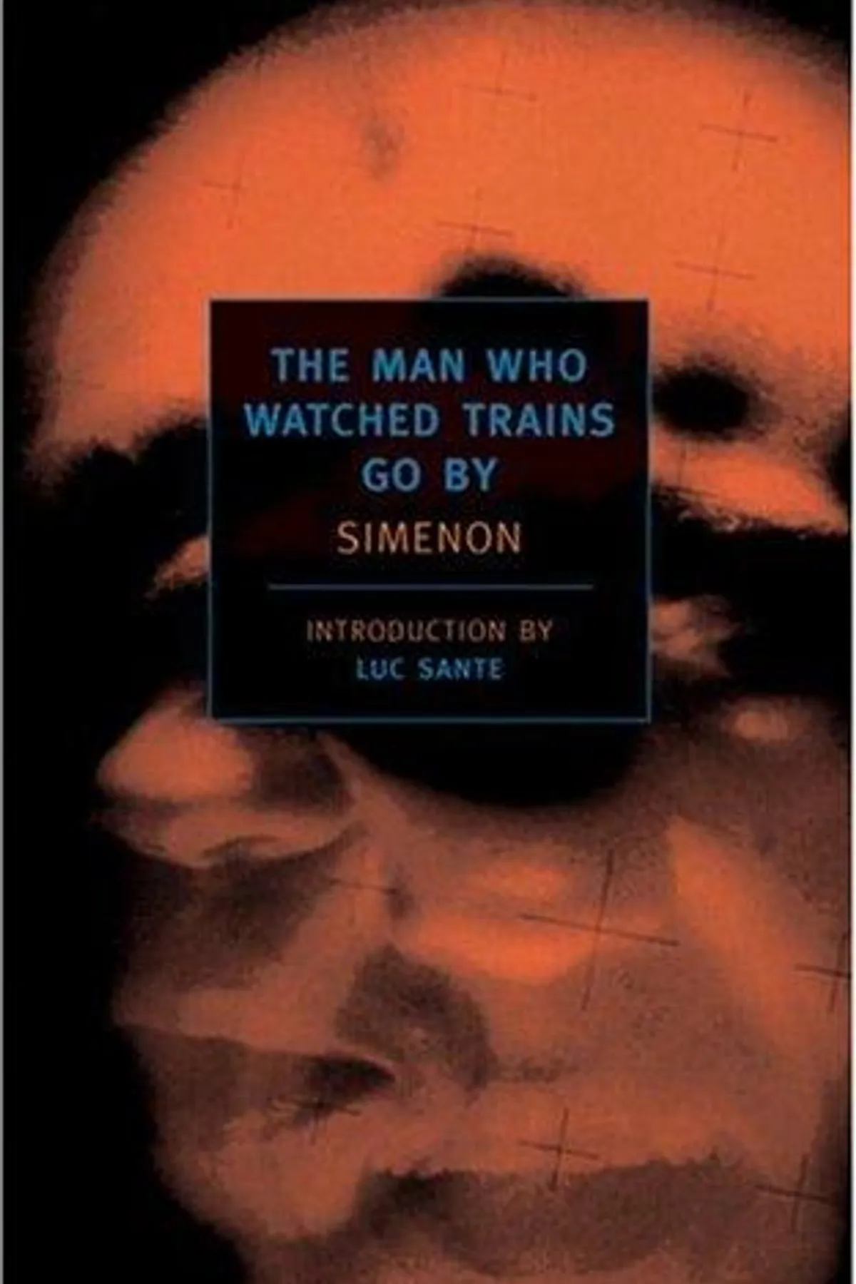 Couverture de « L'homme qui regardait passer les trains »